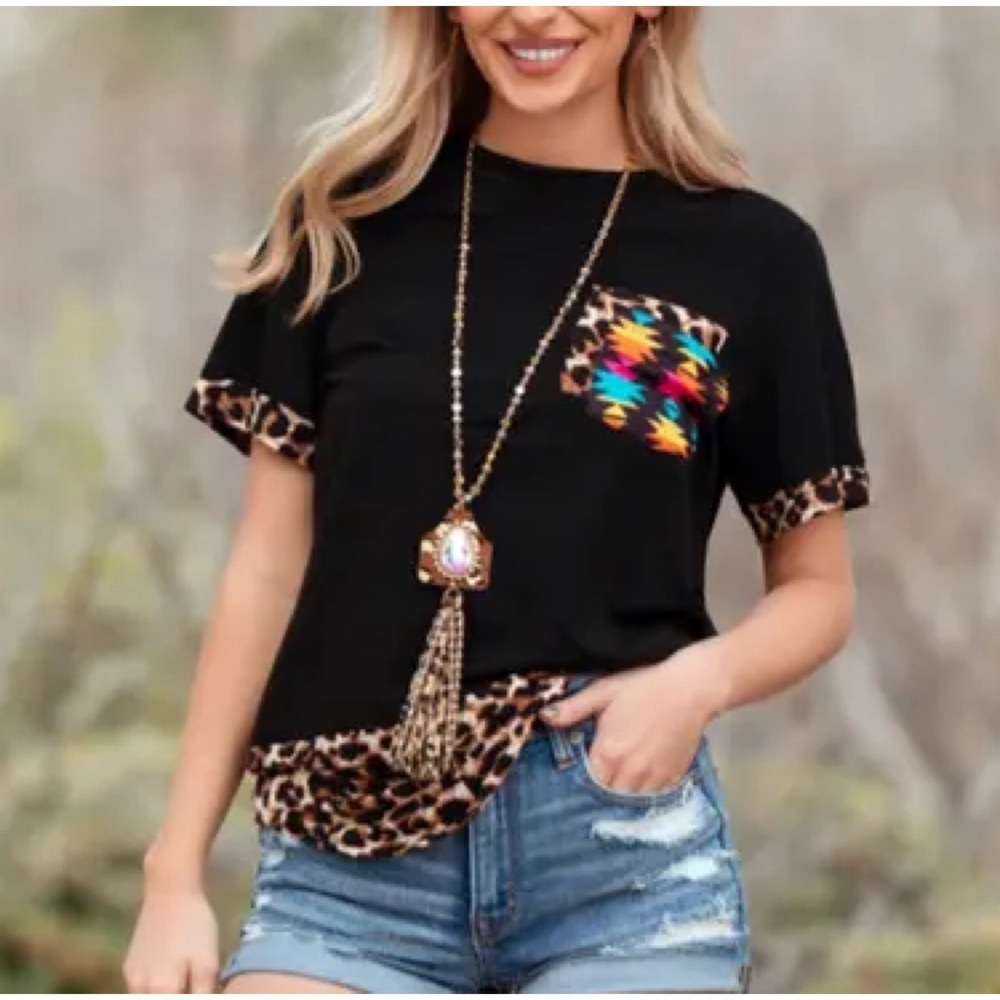 Sunshine & Rodeos black tee with leopard print accents